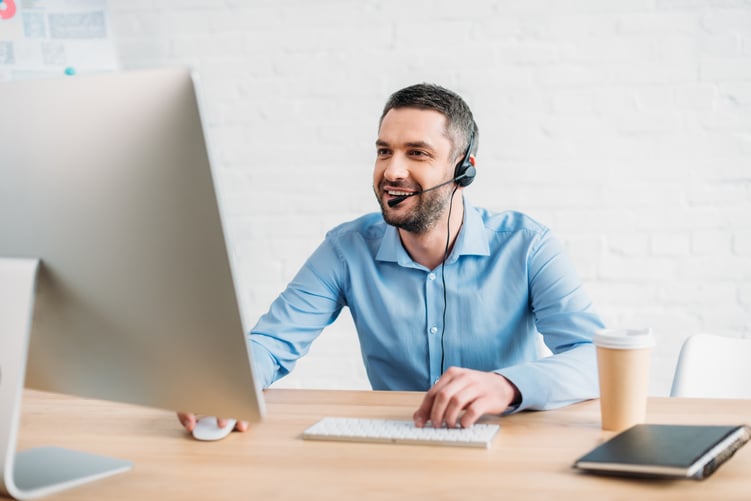 handsome-adult-call-center-worker-working-with-com-2026-01-06-00-39-54-utc